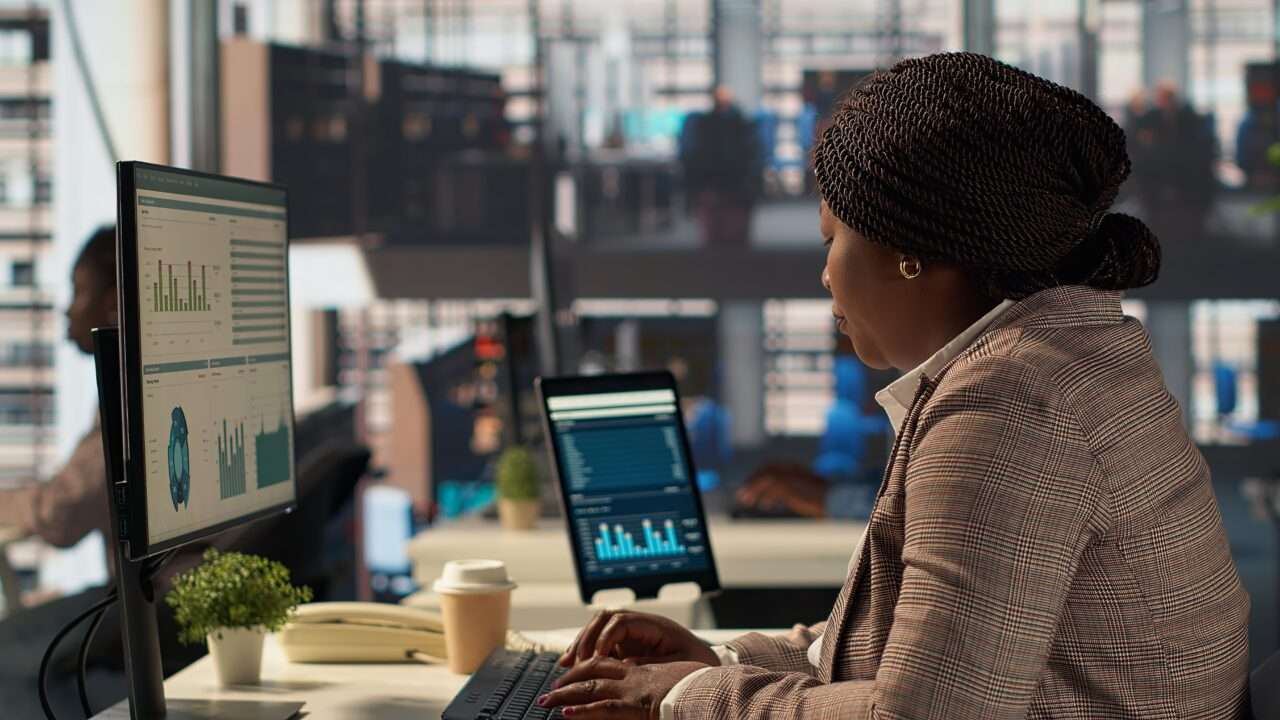 Professional business staff manage financial data to solve tasks for development